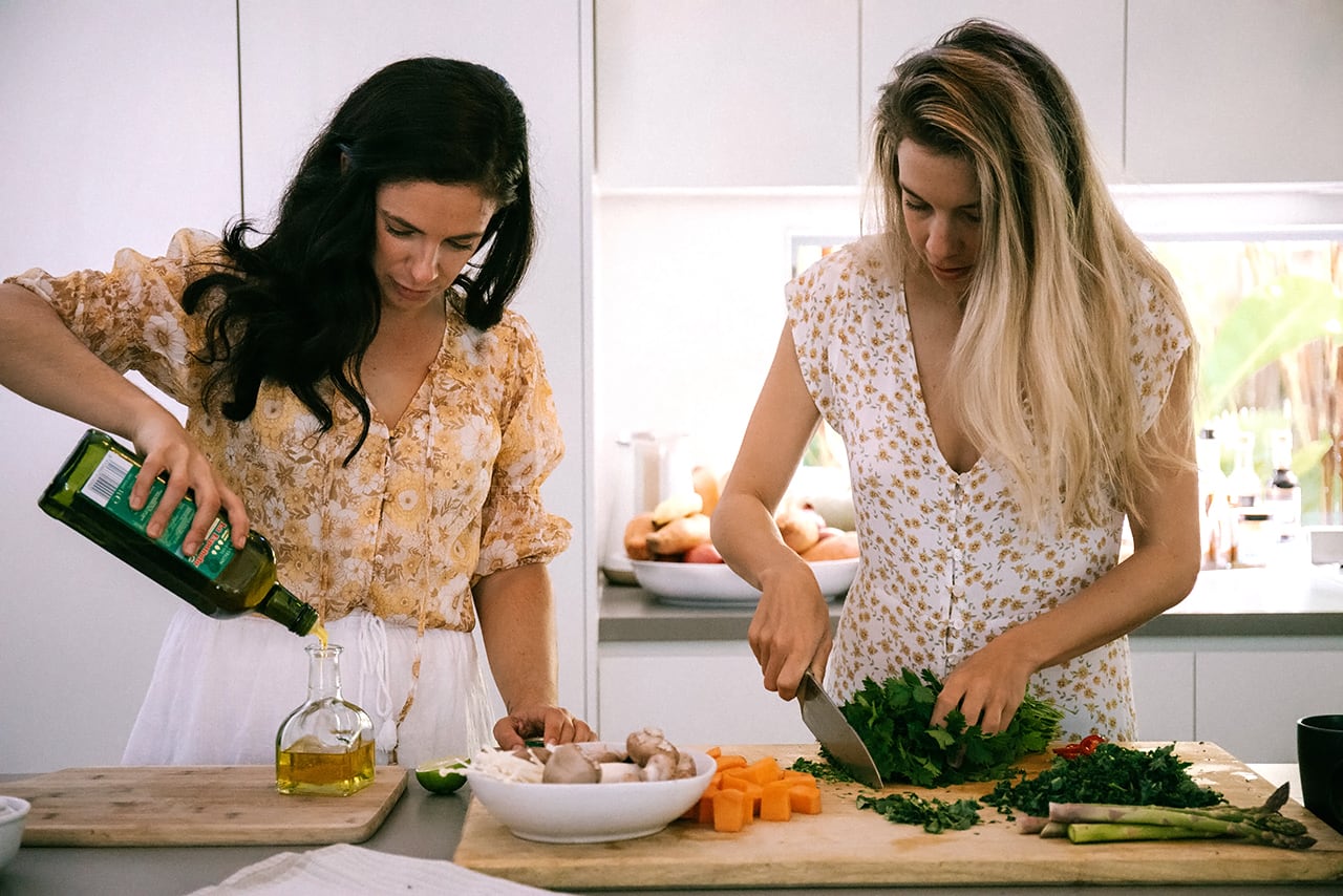 Two beautiful women in the kitchen